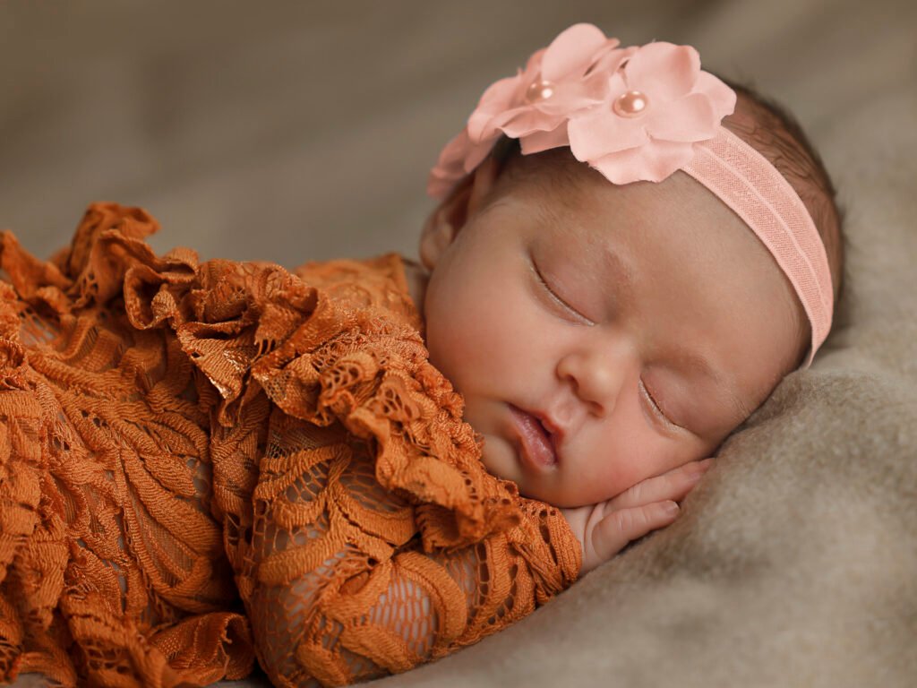 Newborn photography sessions in homes and studios throughout the Denver metro area
