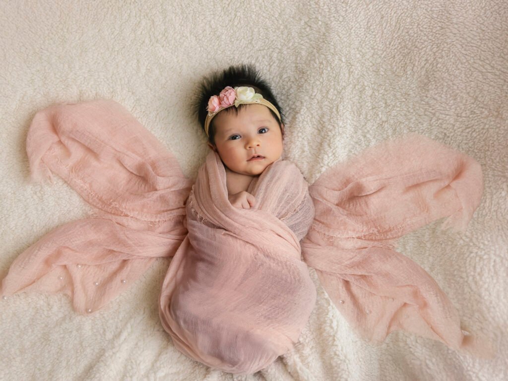 Newborn photography sessions in homes and studios throughout the Denver metro area