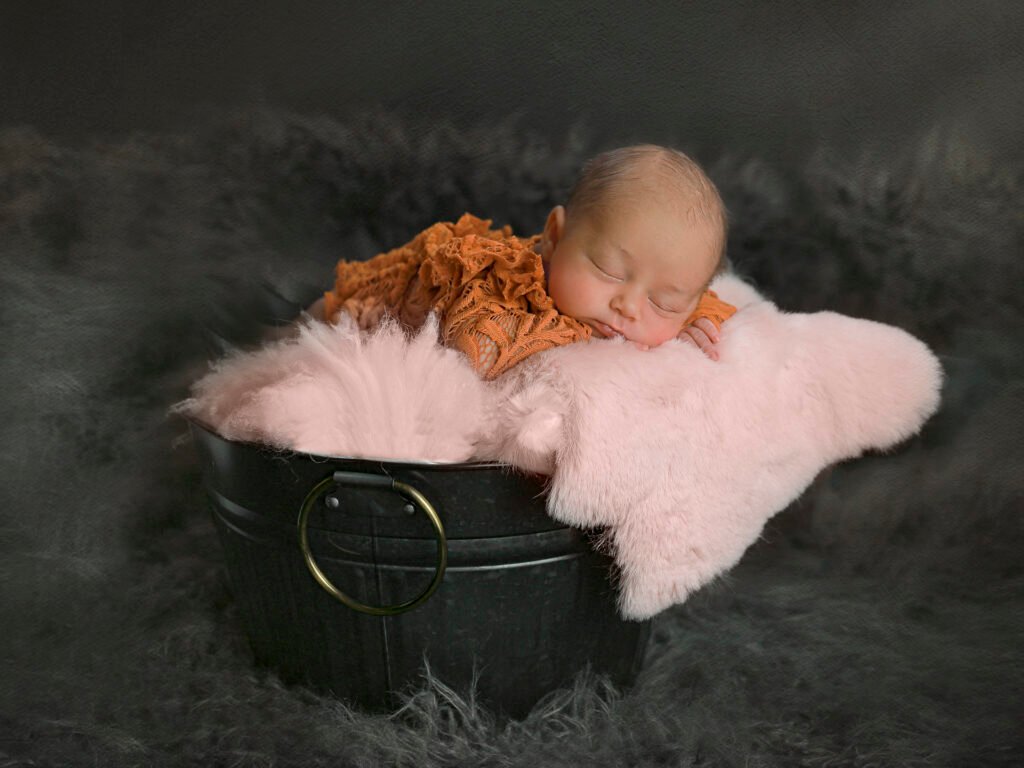 Newborn photography sessions in homes and studios throughout the Denver metro area