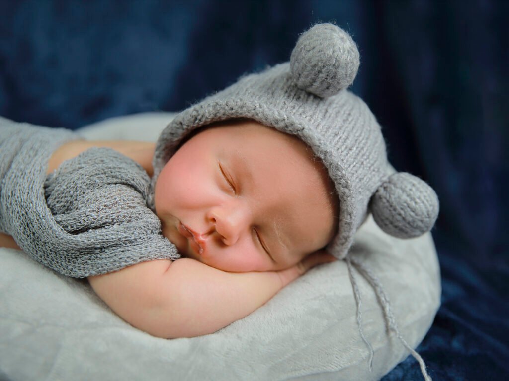 Newborn photography sessions in homes and studios throughout the Denver metro area